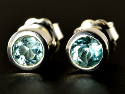 Stunning, handmade gem quality sky blue topaz studs set in pure silver.