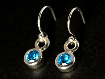 Stunning, handmade gem quality swiss blue topaz drops set in pure silver.