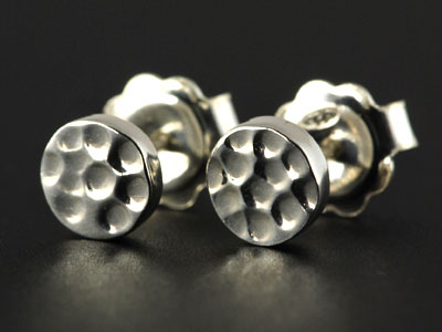 Chunky round stud earrings with punched effect
