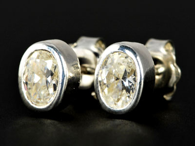Stunning, handmade cubic zirconia oval studs set in pure silver.