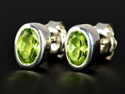 Stunning, handmade gem quality peridot oval studs set in pure silver.