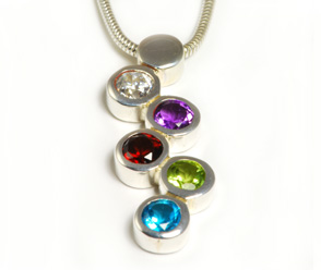 Handcrafted silver pendant with  semi-precious stones